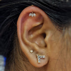 Vertical Helix Titanium Jewelry – 3 CZ Marquise Cluster