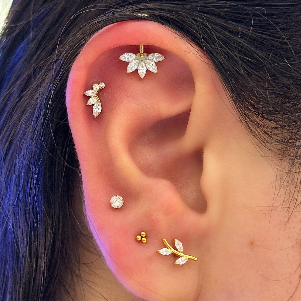 Vertical Helix Titanium Jewelry – 5 CZ Lotus Design